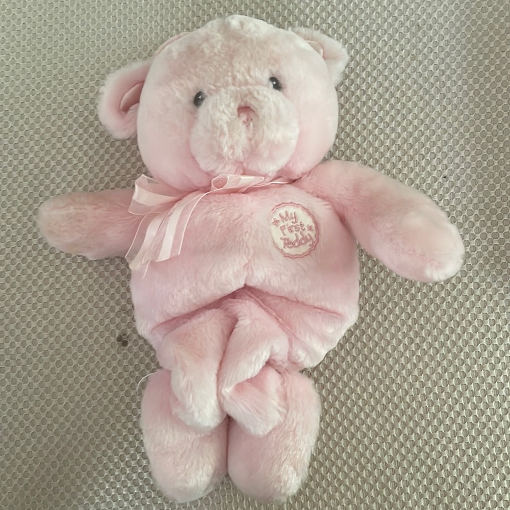 Pink teddy bear that has a lullaby. It’s called a my first teddy